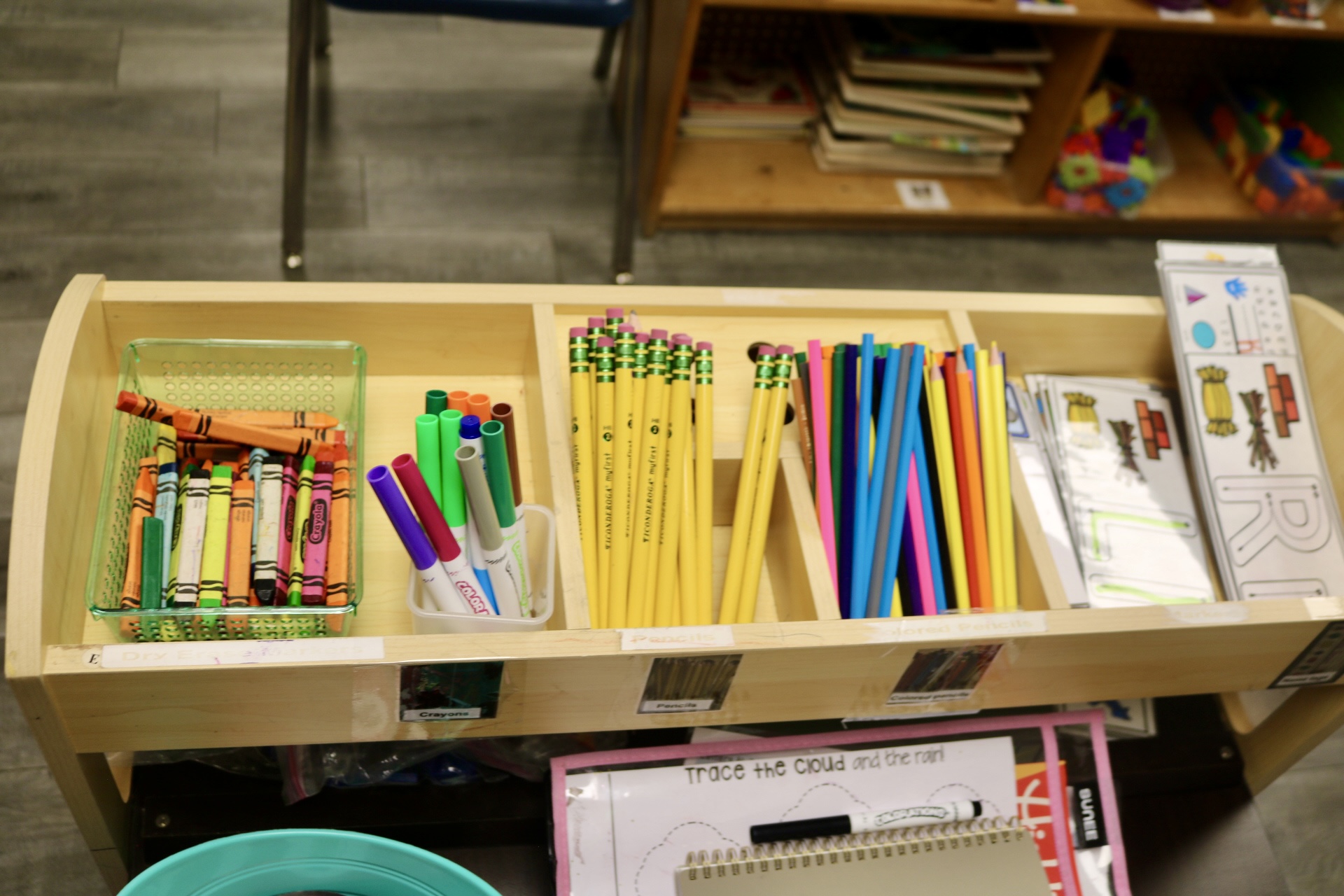 Classroom supplies — crayons, markers, and pencils